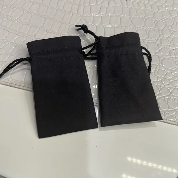 TWO authentic David yurman pouches